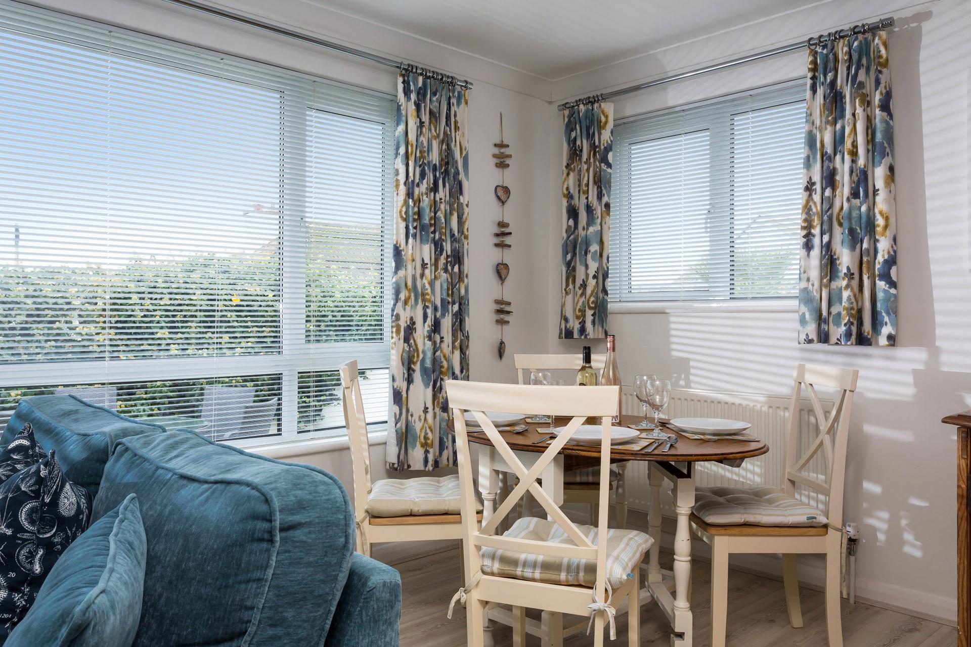 Coastal-inspired decor reflects the close proximity to the sea.