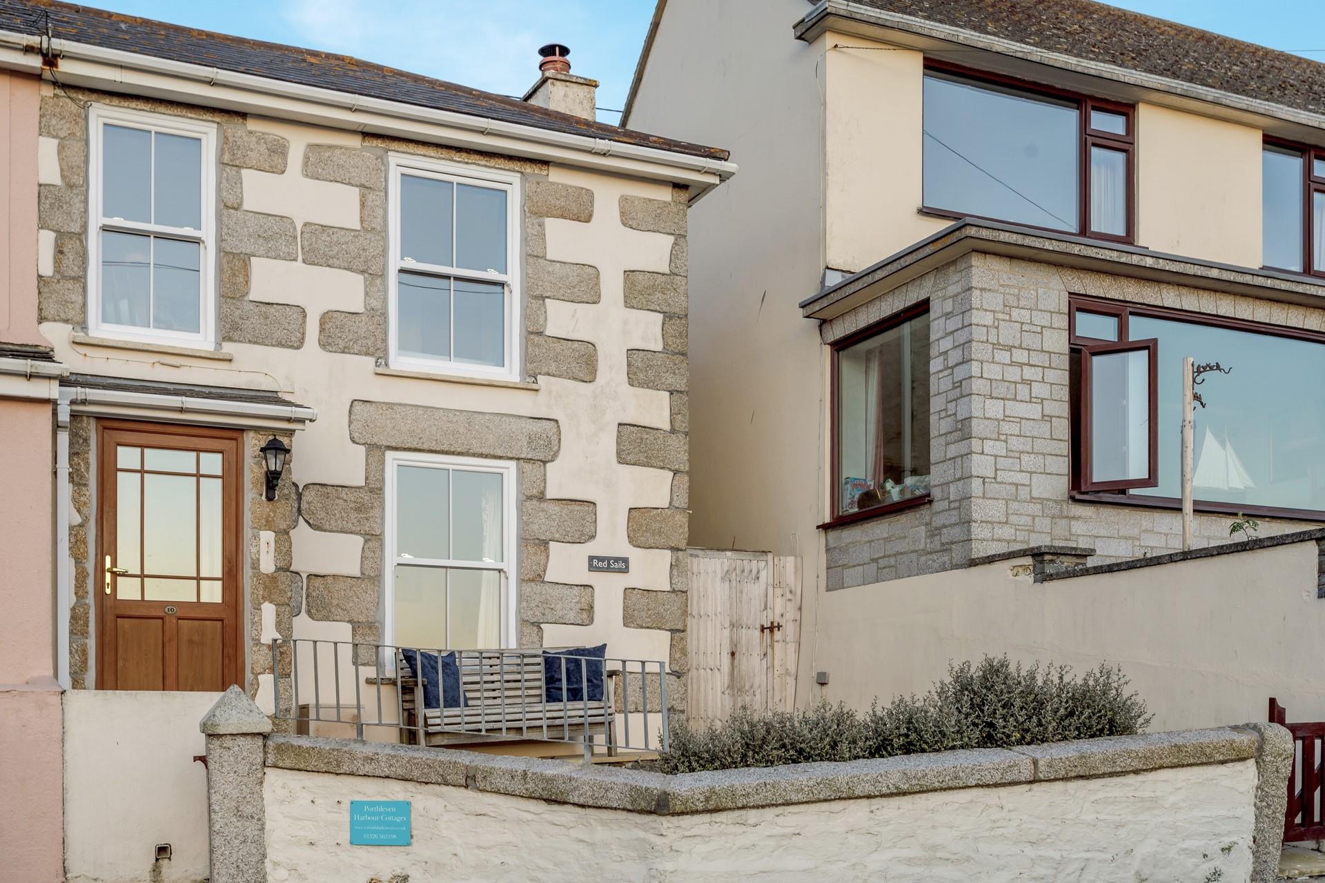 Sit out on the front bench and watch the sun come down with a glass of wine in hand.