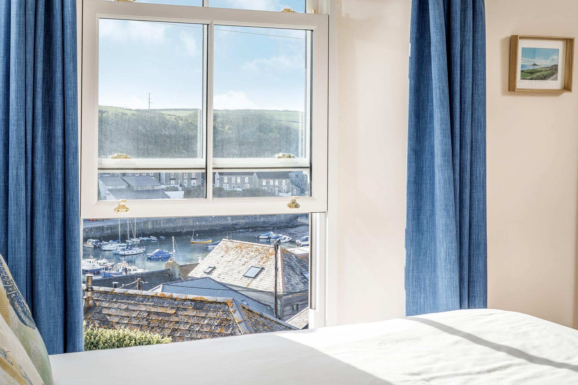 Sip your morning cuppa while watching the boats bobbing in the harbour.