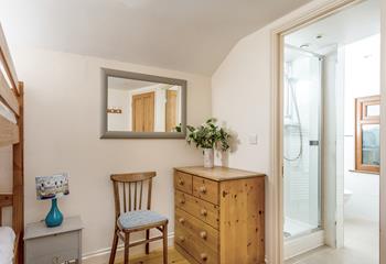 Bedroom 3 also has an en suite with a shower for washing off the sand.