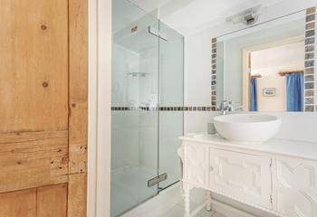 The en suite has a large shower for washing the day away.