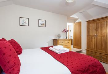 Fluffy towels and soft sheets await you in bedroom 1.