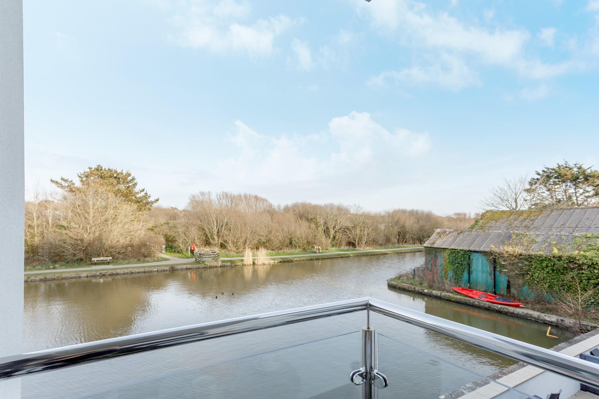 Enjoy peaceful views of the canal from the waterside balcony.