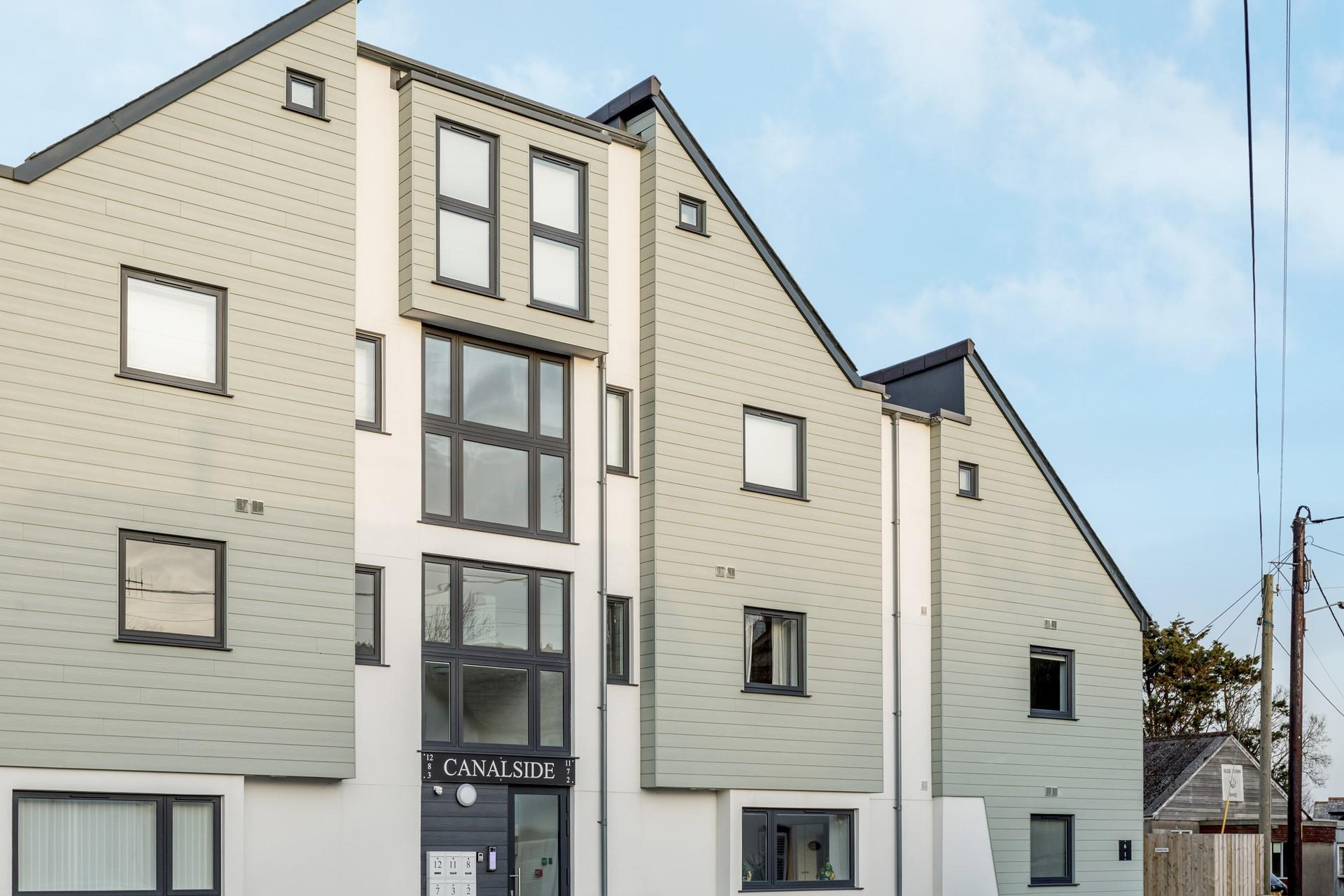 There is an EV charging point that is shared and available for guests' use.