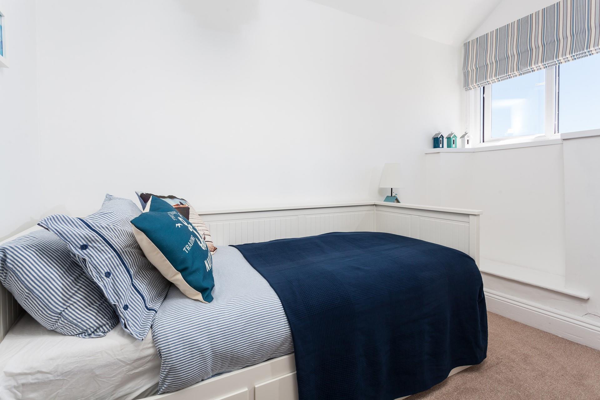 Bedroom 3 has a single bed to snuggle into.