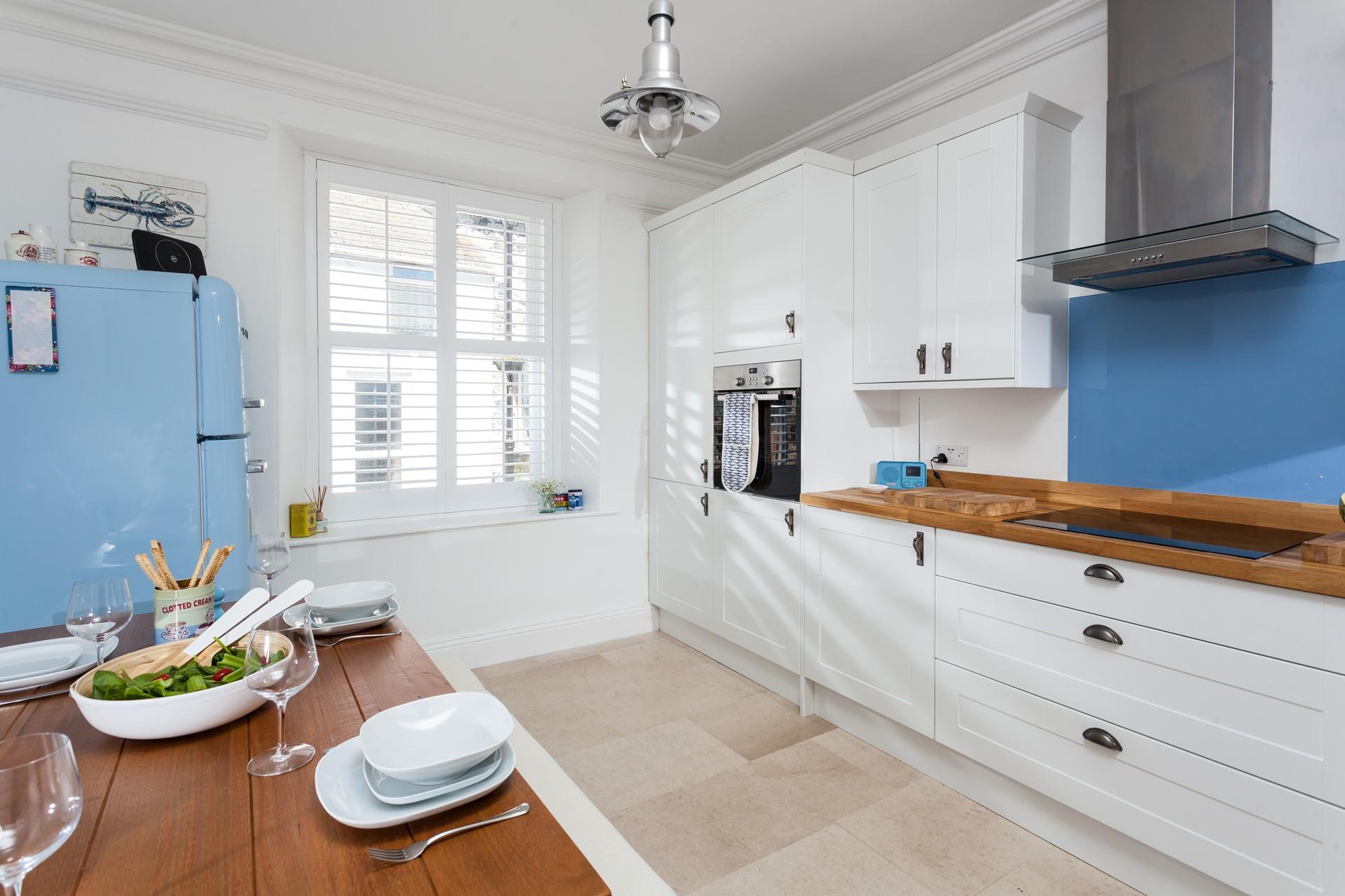 The kitchen is well-equipped for cooking up a storm in the evening.