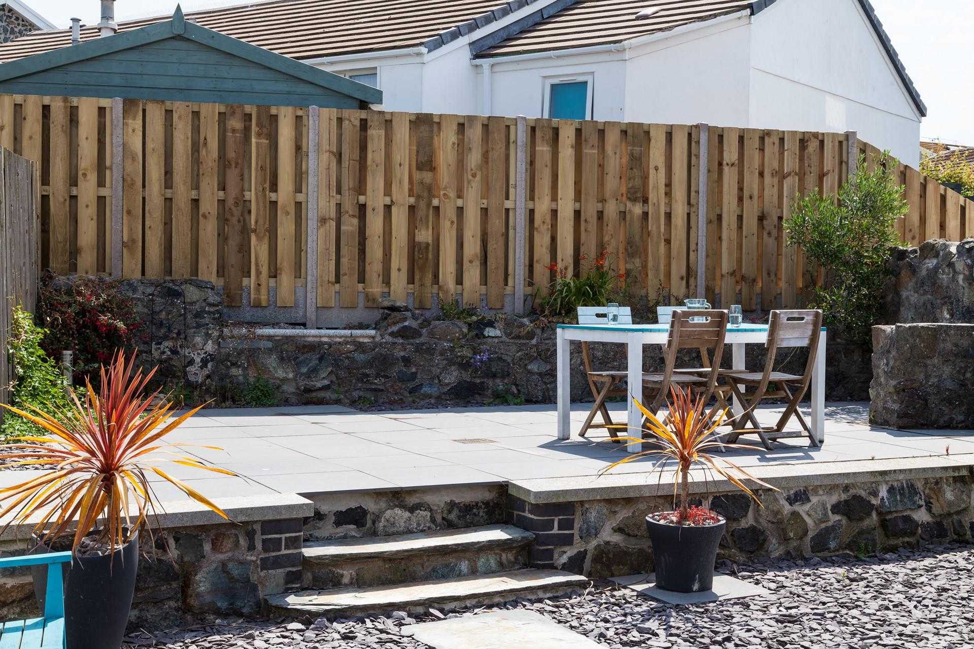 Enjoy long lazy lunches in the sun trap garden.