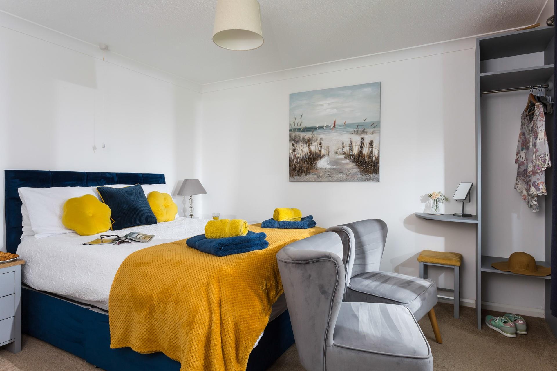 The sumptuous king size bed offers you a relaxing night's sleep after days on the beach.