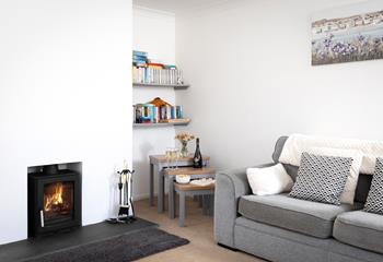 Snuggle up, glass in hand, in front of the fire. 