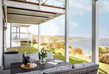 Spend evenings relaxing on the decking with a glass of your favourite wine with the sea views as a backdrop.