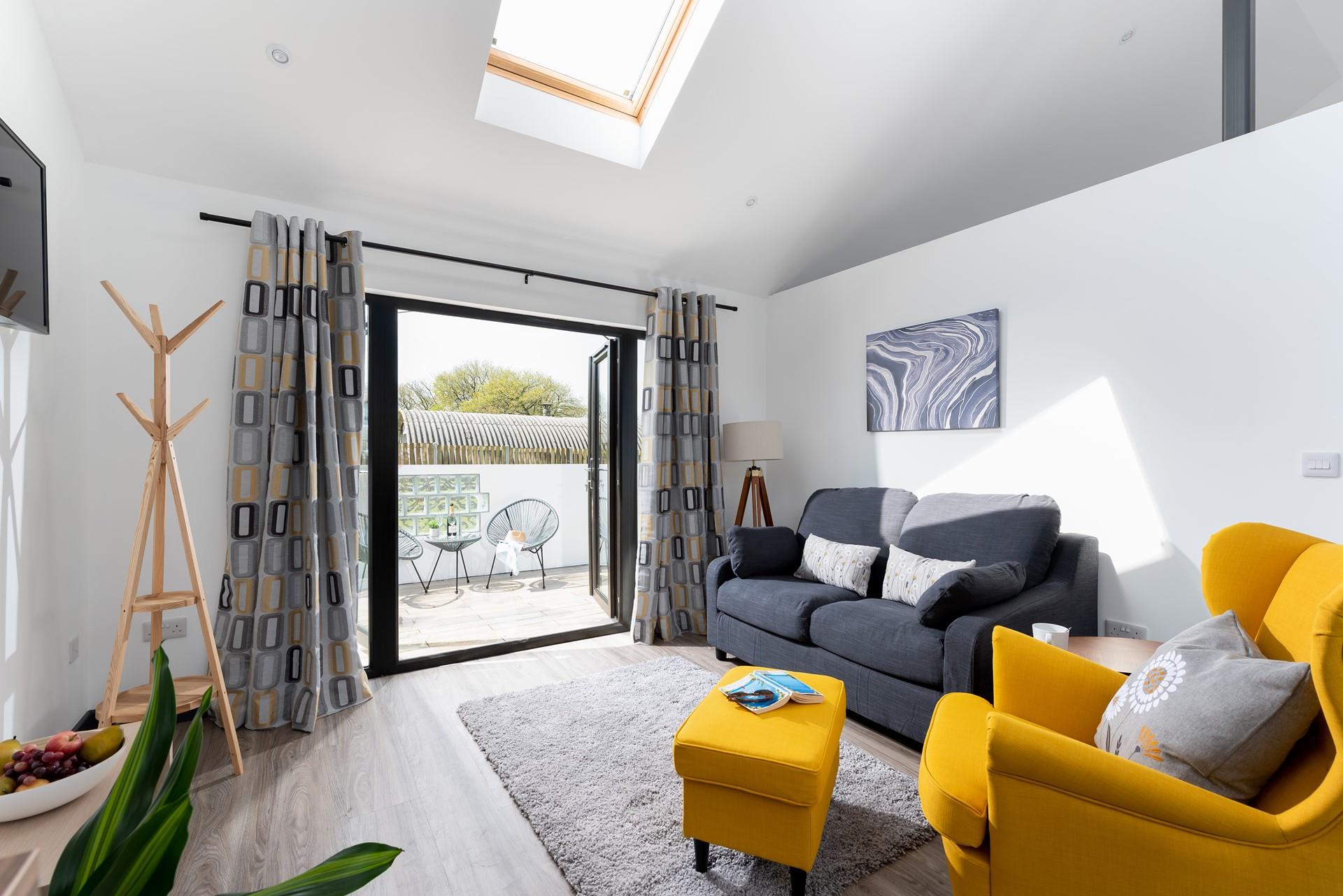 Sink into the sumptuous sofa and enjoy a movie night.