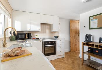 The kitchen is light and bright, with lots of stylish features.