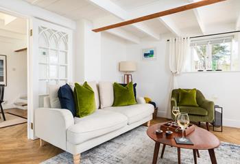 Pure relaxation awaits you at Lake Cottage with plush furnishings and rustic features.
