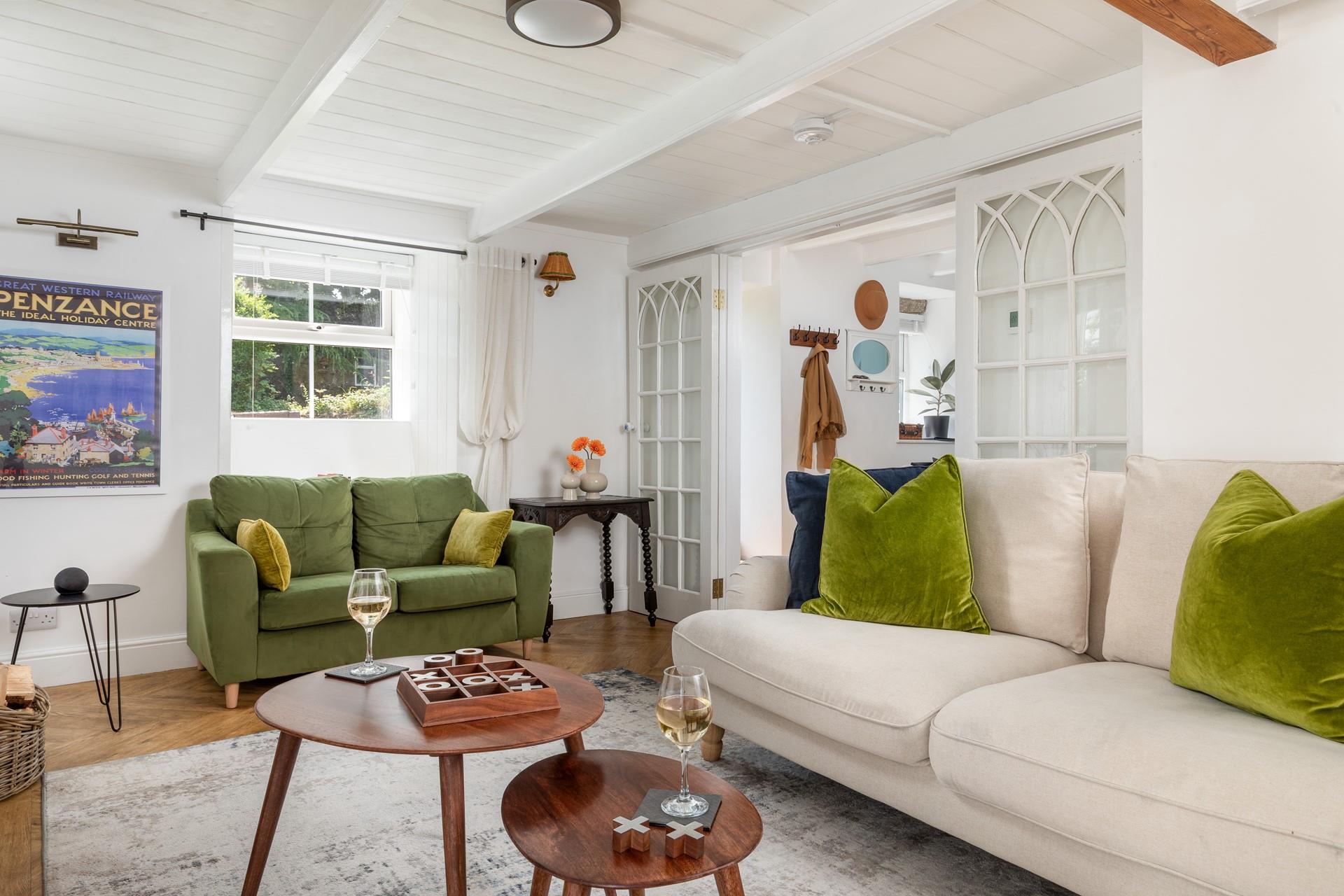 Relax in the cosy sitting room after a day of exploring west Cornwall.