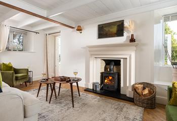 The sitting room leads out to the conservatory and beautiful garden.