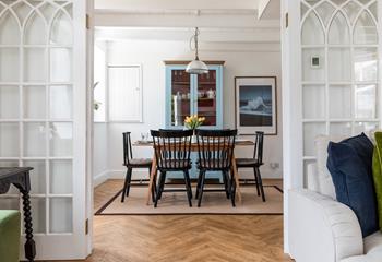 Open the front door into the bright dining room, the perfect space for a leisurely holiday dining.
