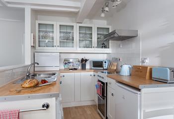 Cook tasty lazy breakfasts and hearty dinners in the fully equipped kitchen.