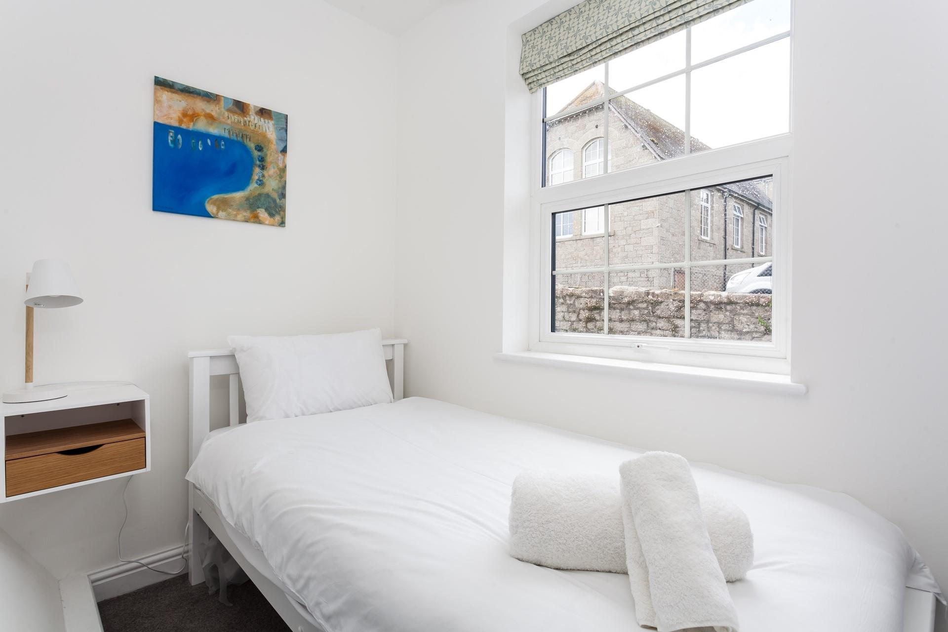 Bedroom 3 has a single bed for the little one to tuck into.