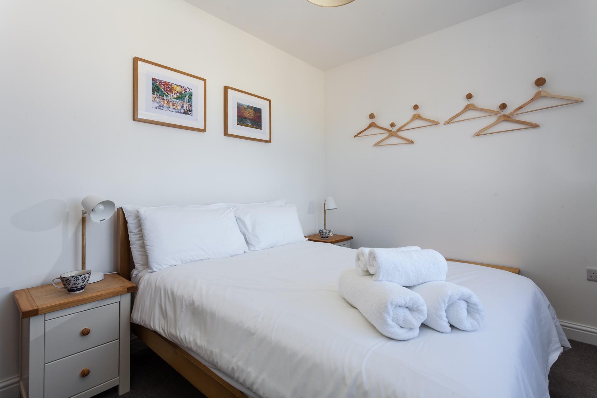 Soft sheets and fluffy towels await you in this lovely home.