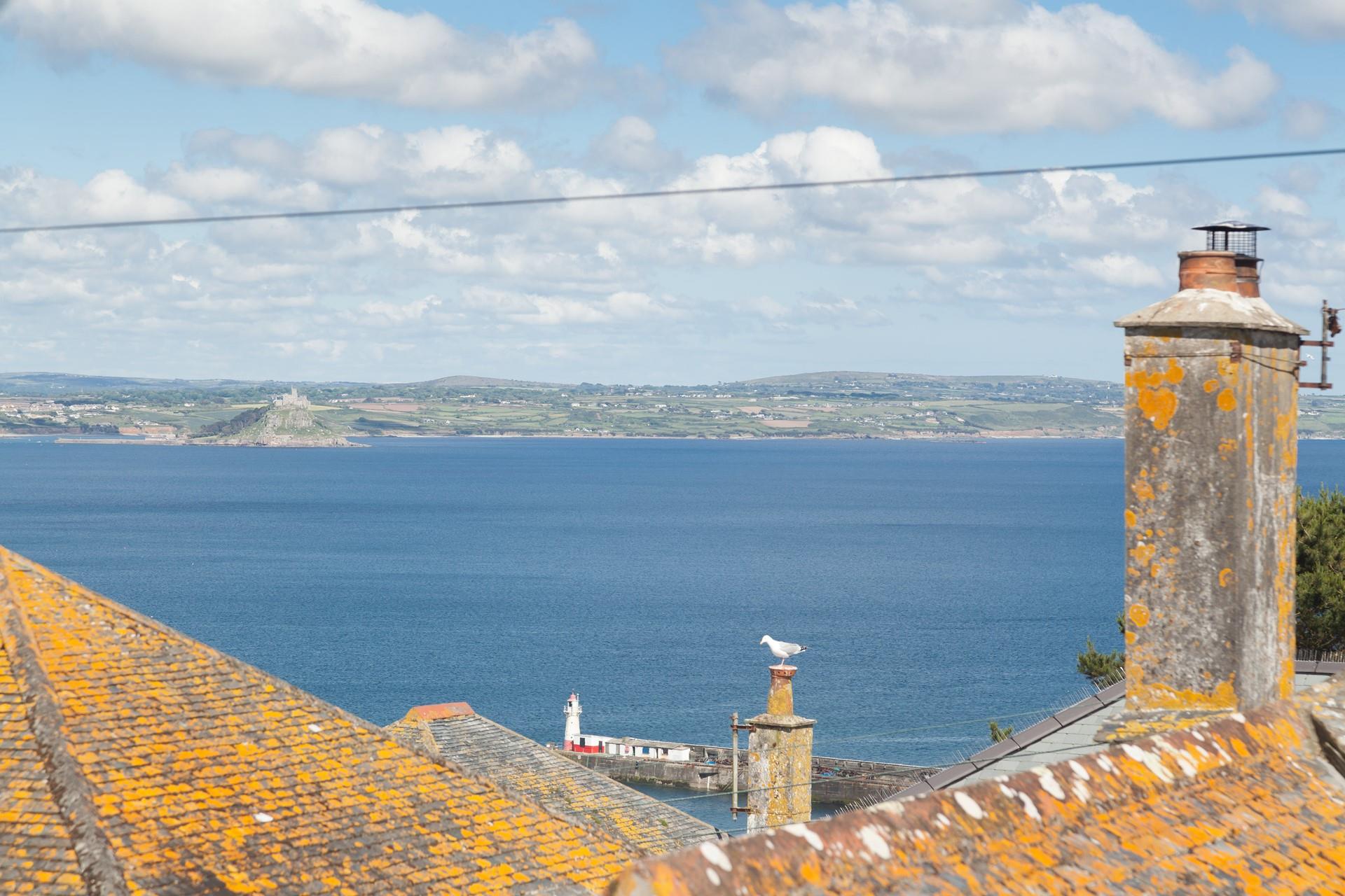 Take in the vast views of Mounts Bay over the rooftops of Newlyn.