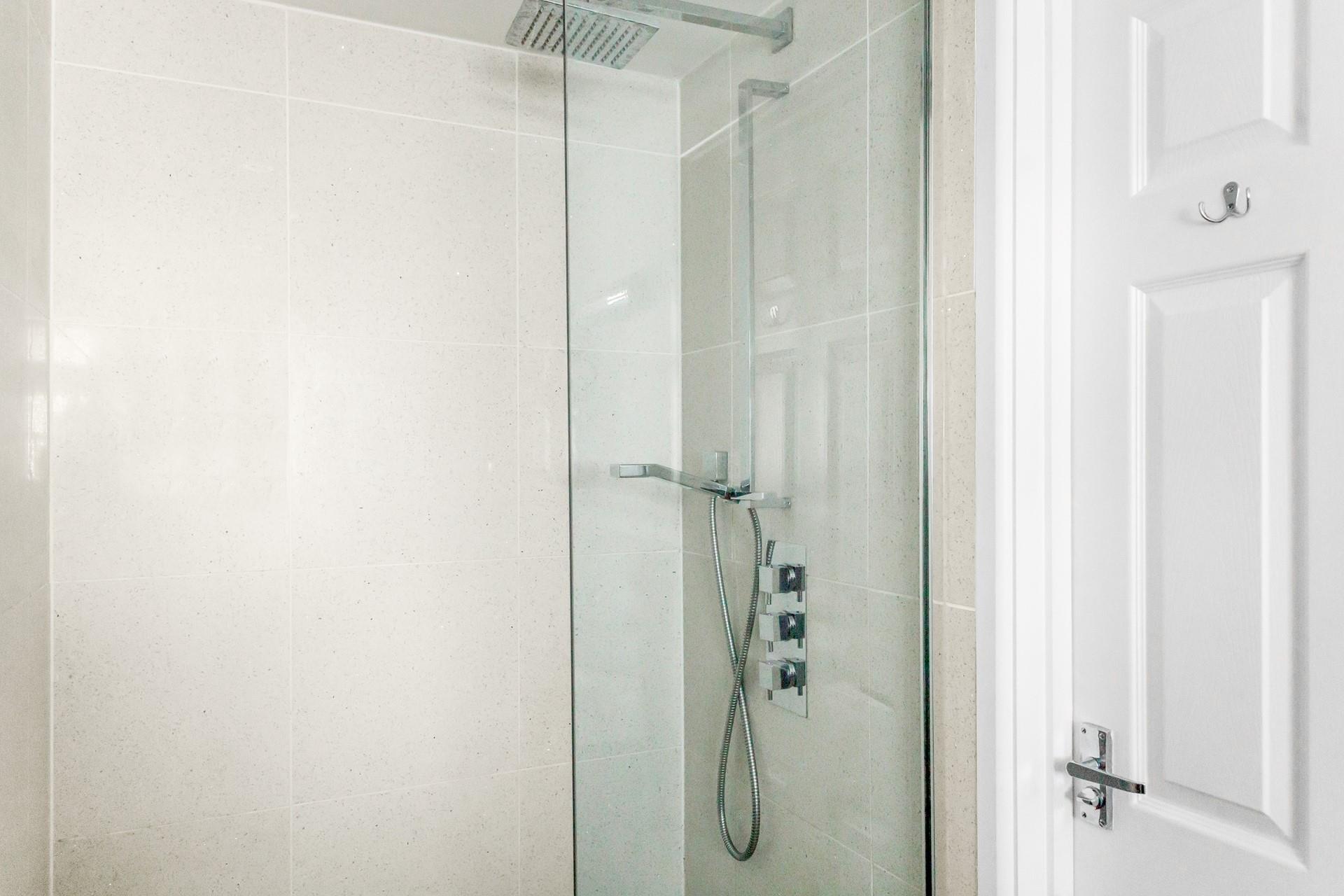 Wash off sandy towels in the rainfall shower.
