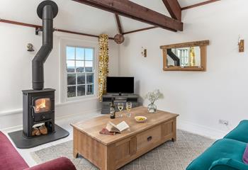 Throw some logs on the fire and spend a cosy afternoon in the comfortable sitting room in the chilly months.