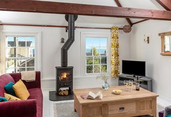 Sink into the sofa with the woodburner roaring, gazing at the sea view from the window.