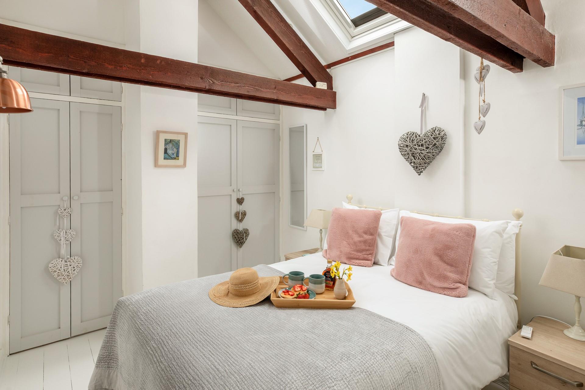 Pastel decor creates a calming space to drift off each night.