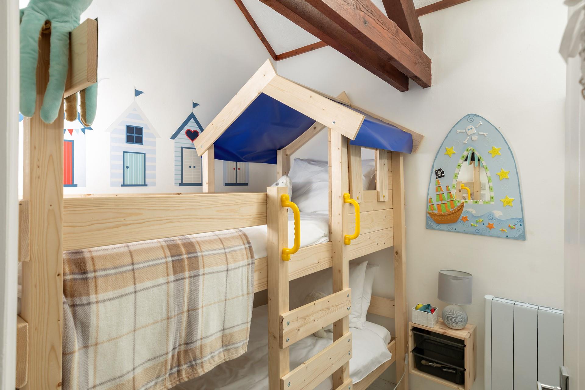 The little ones will be excited to climb into the fun bunk beds each night.