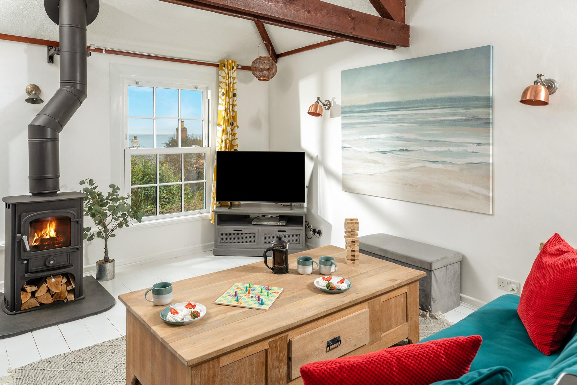 Throw some logs on the fire and spend a cosy afternoon in the comfortable sitting room in the chilly months.