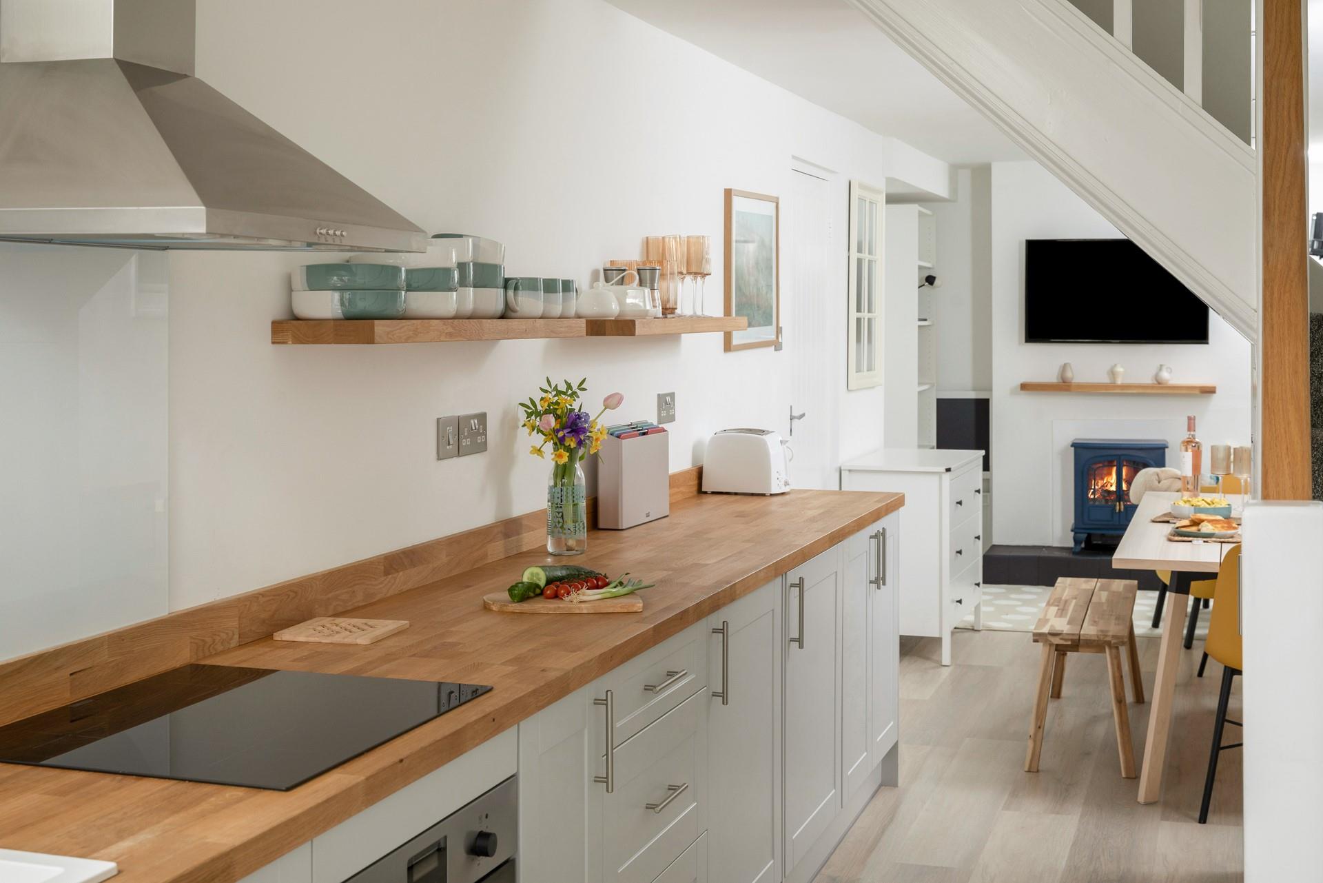 The kitchen is perfectly equipped for preparing and cooking delicious meals.