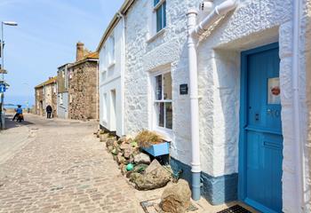 A traditional fisherman's cottage awaits you just steps from the beach.