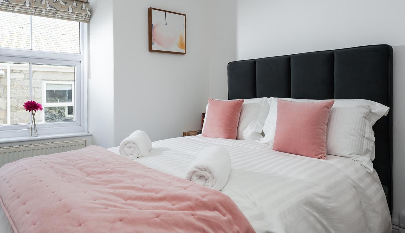 Sink into the soft sheets and drift off for a peaceful night's sleep.