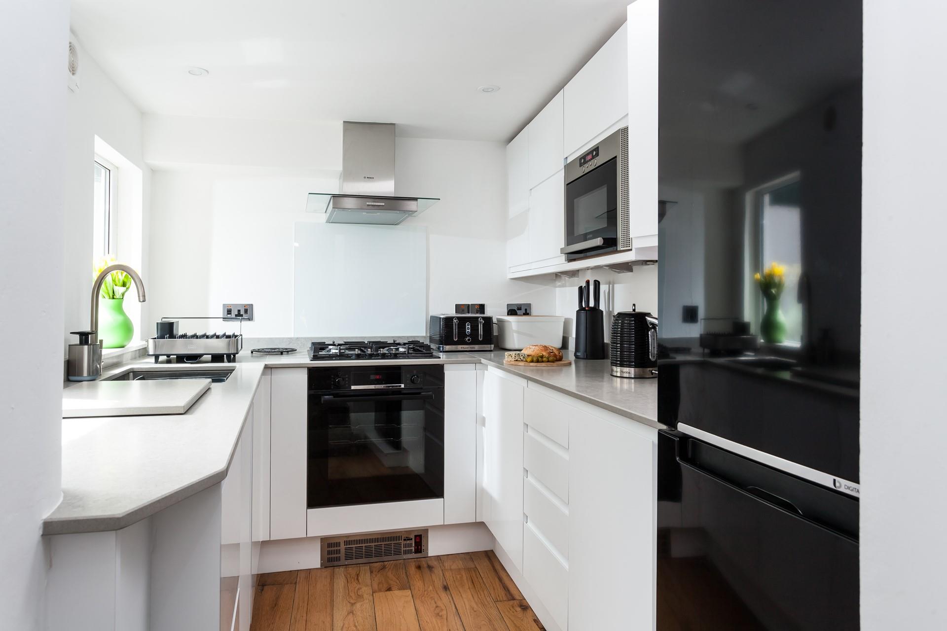 Cook up a storm in the modern and sleek kitchen.