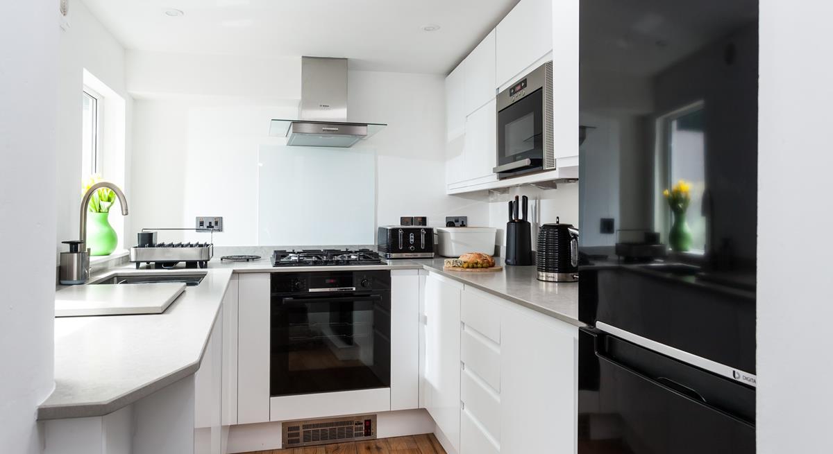 Cook up a storm in the modern and sleek kitchen.