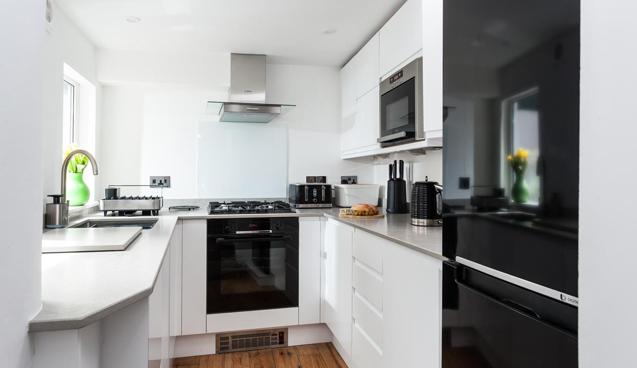 Cook up a storm in the modern and sleek kitchen.