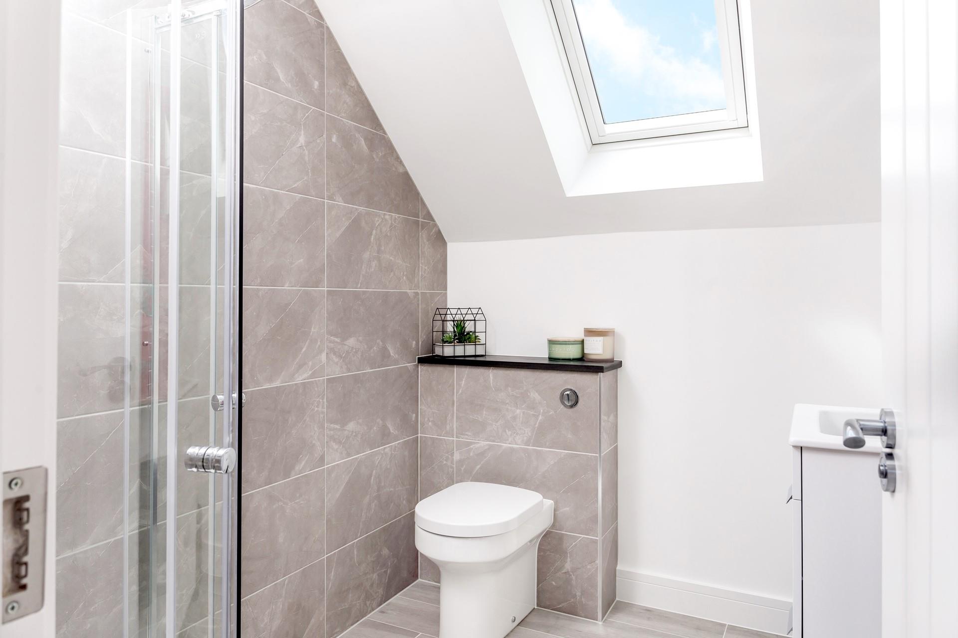 Shower off the day in the modern en suite.