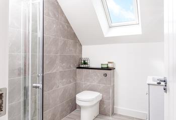 Shower off the day in the modern en suite.