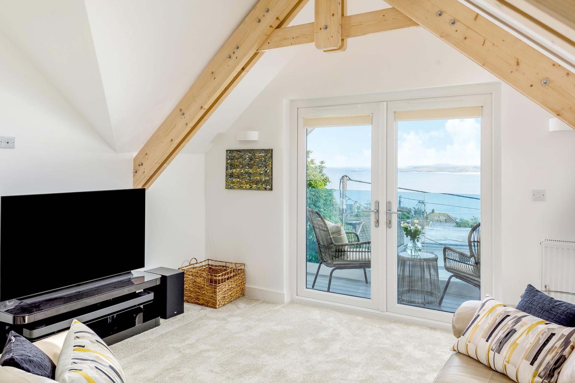 Relax on the luxurious sofas after spending the day on the beach.