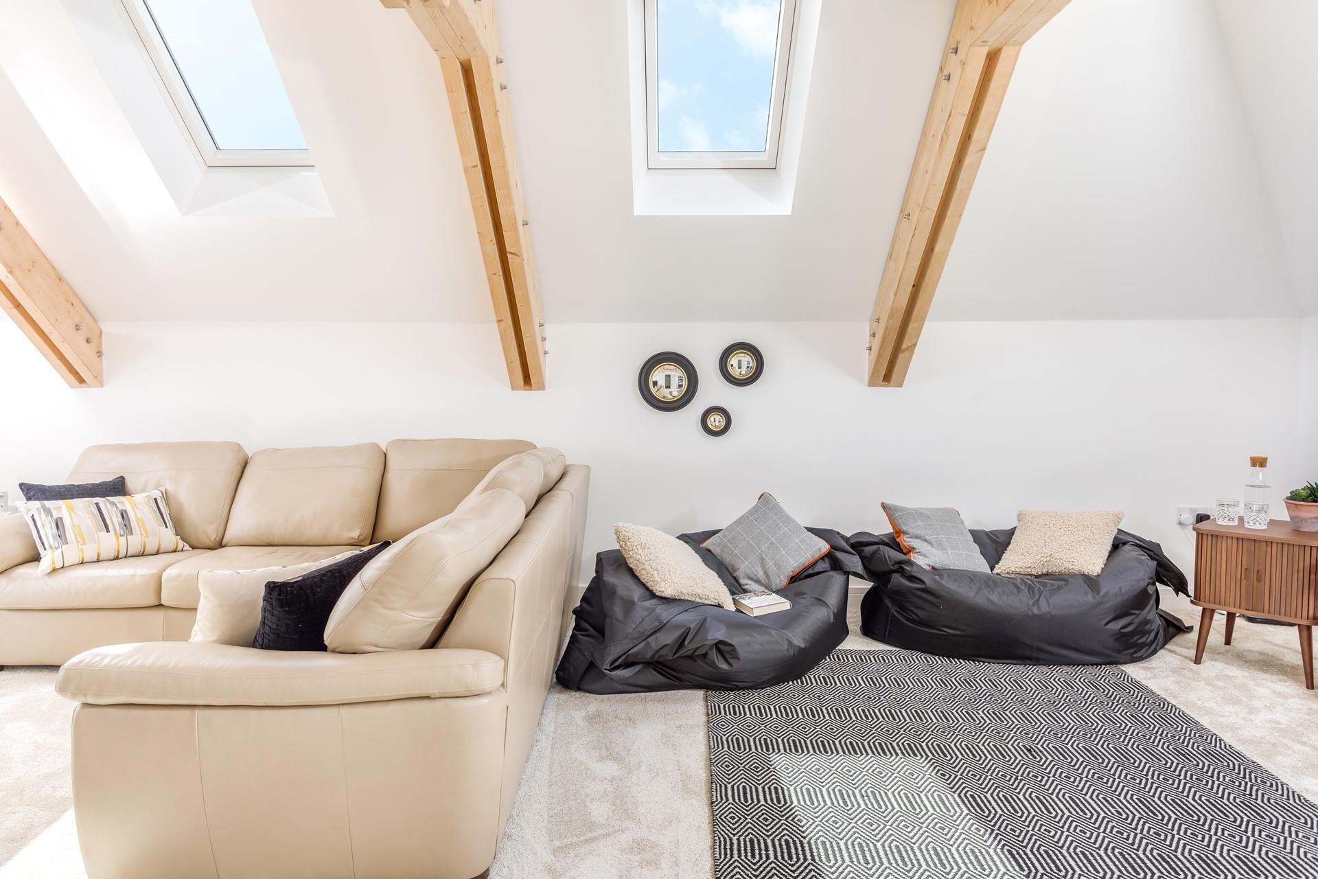 The snug area is ideal for the kids to relax whilst the adults enjoy a drink in the sitting room.