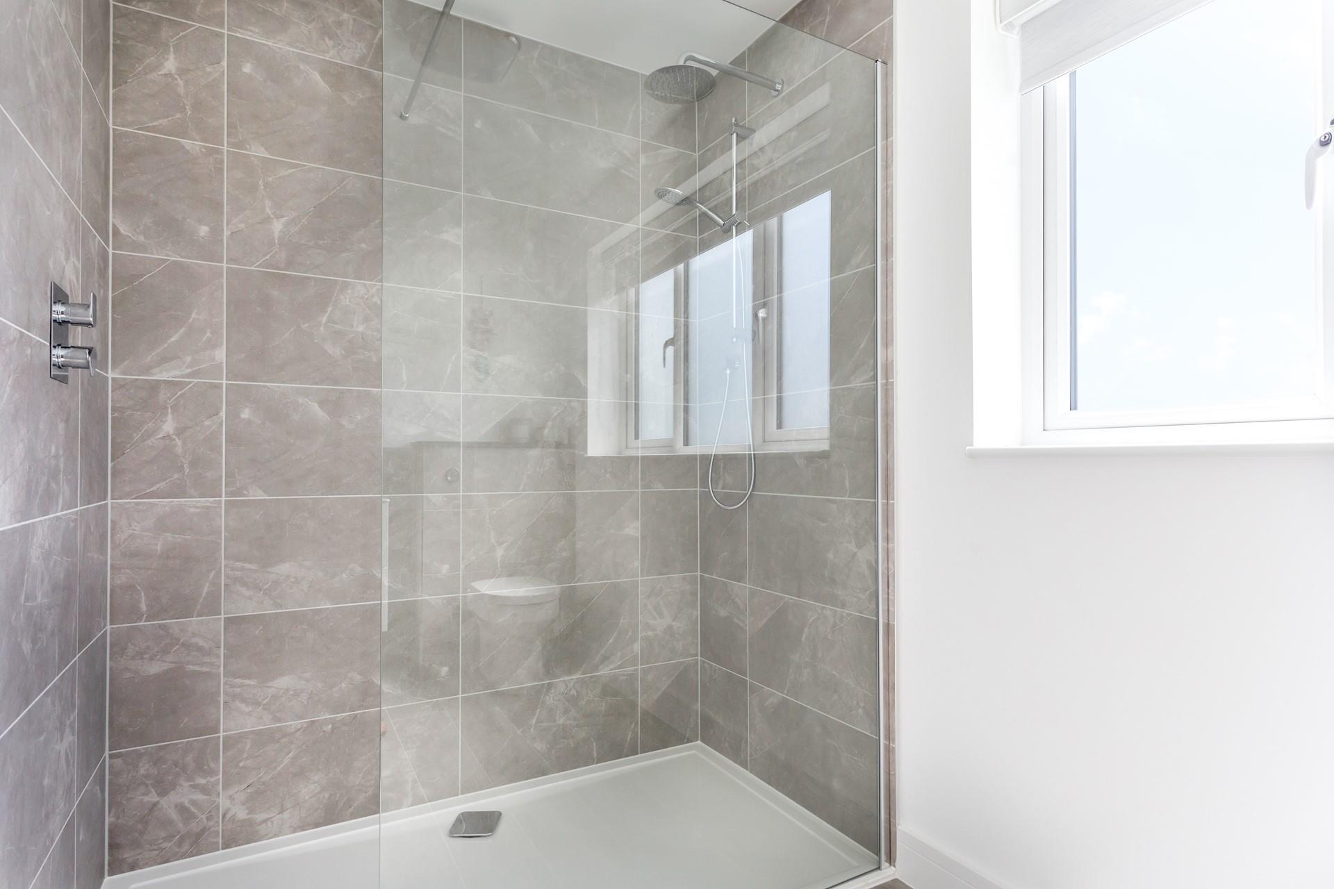 The large rainfall shower is perfect for washing the sand off after beach days.