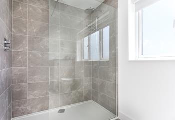The large rainfall shower is perfect for washing the sand off after beach days.