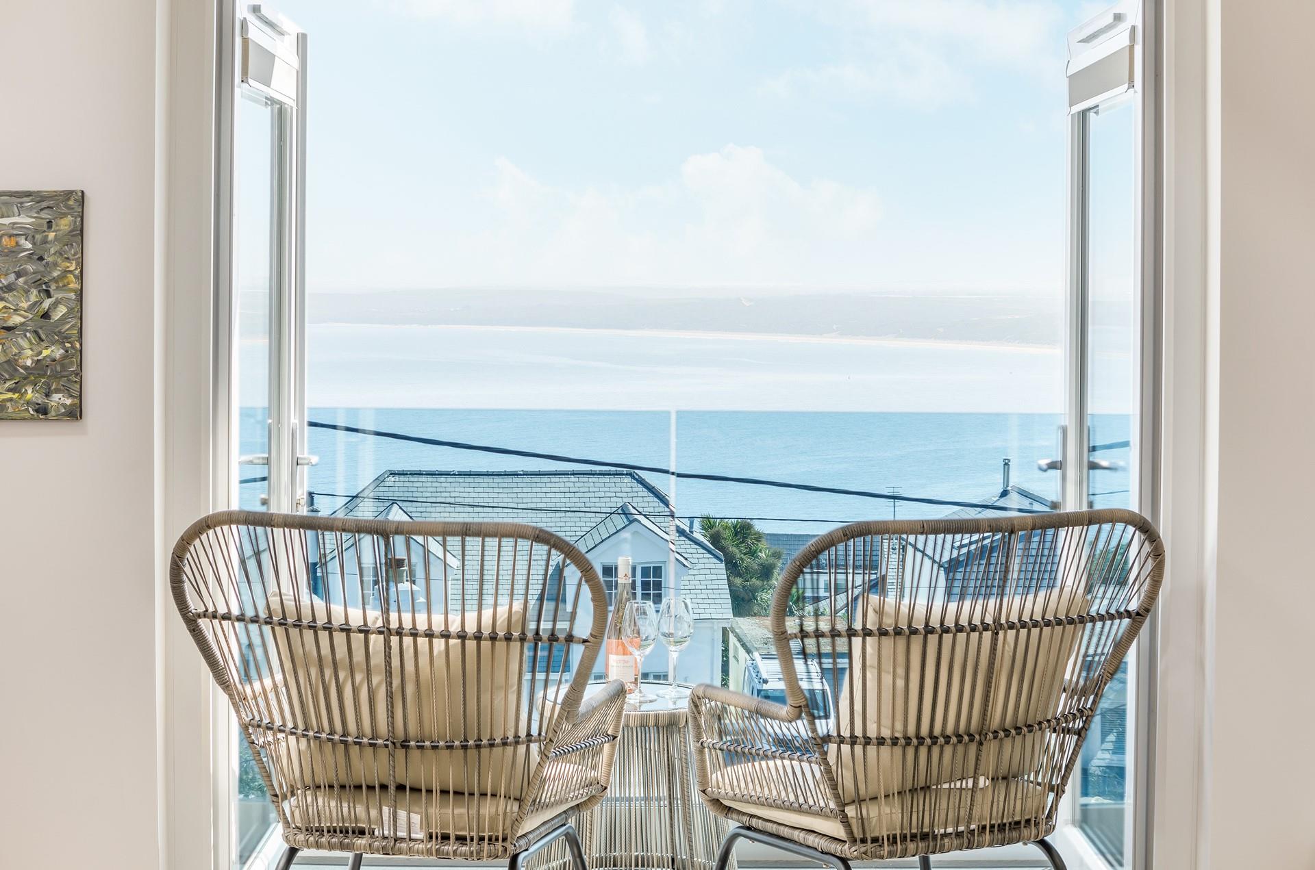 Spend the evening watching the sun come down on the balcony.