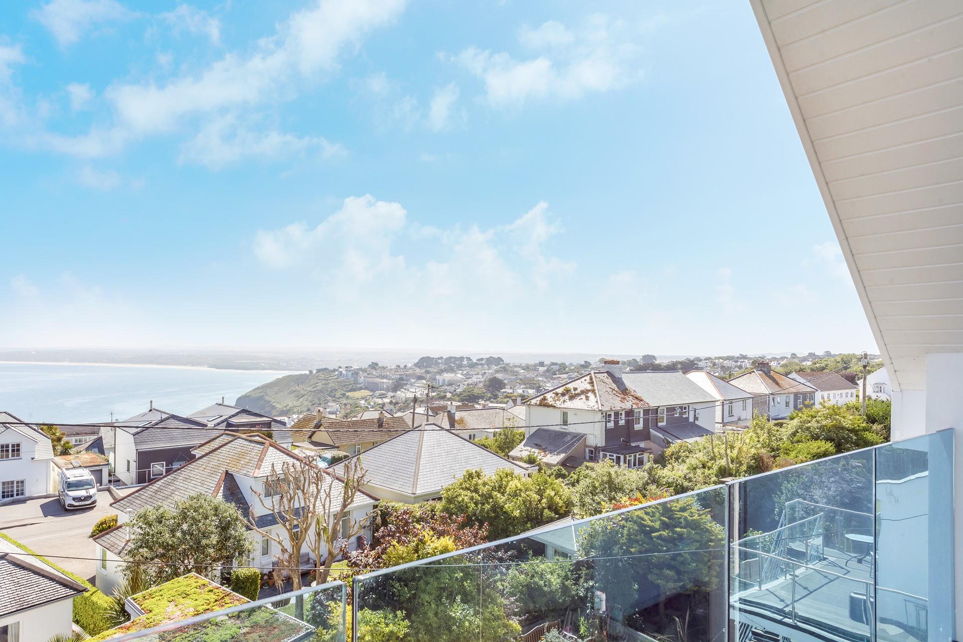 The balcony provides the perfect spot to watch the sun come down with a glass of wine.