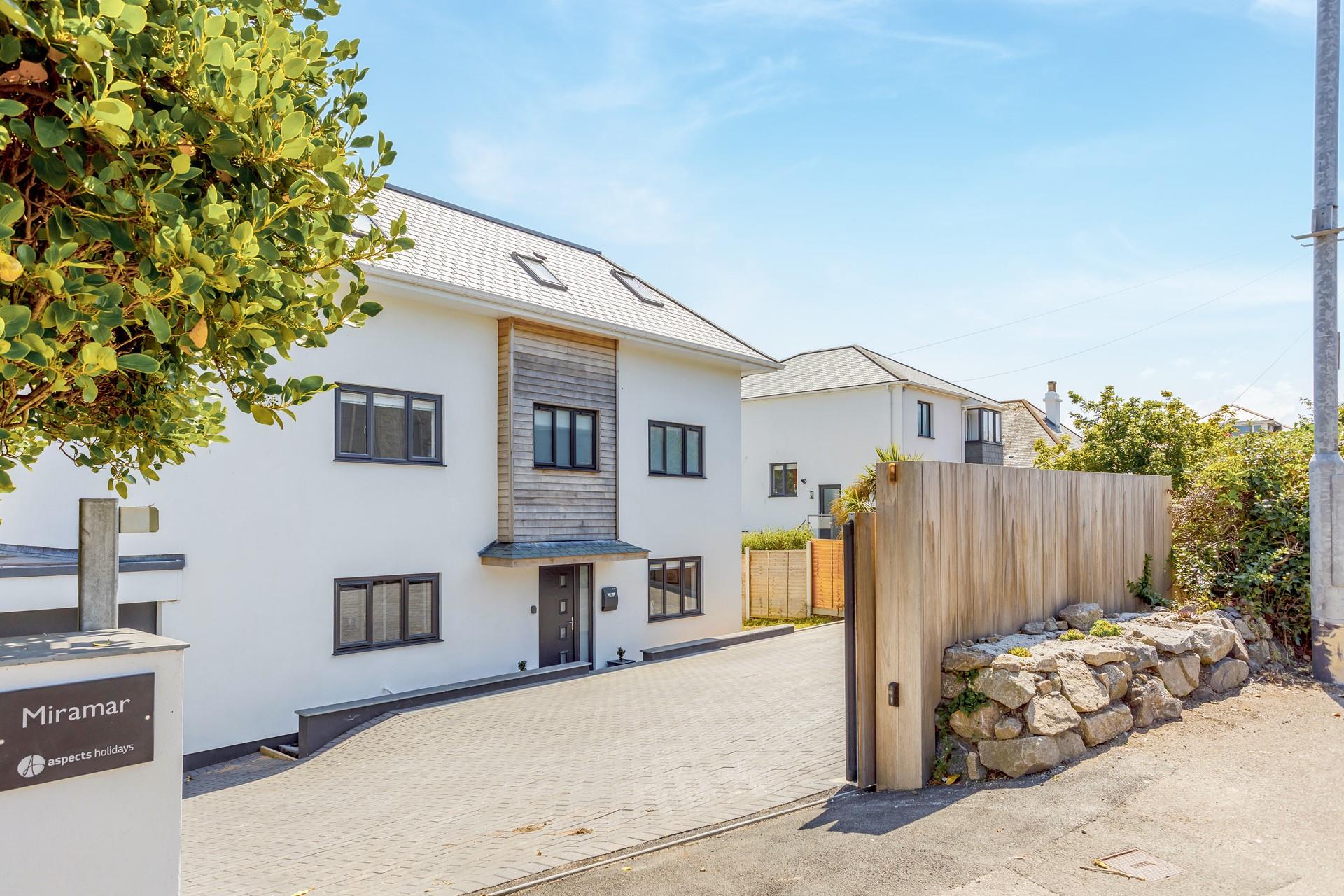 There is ample parking space for the whole family in this large modern home.