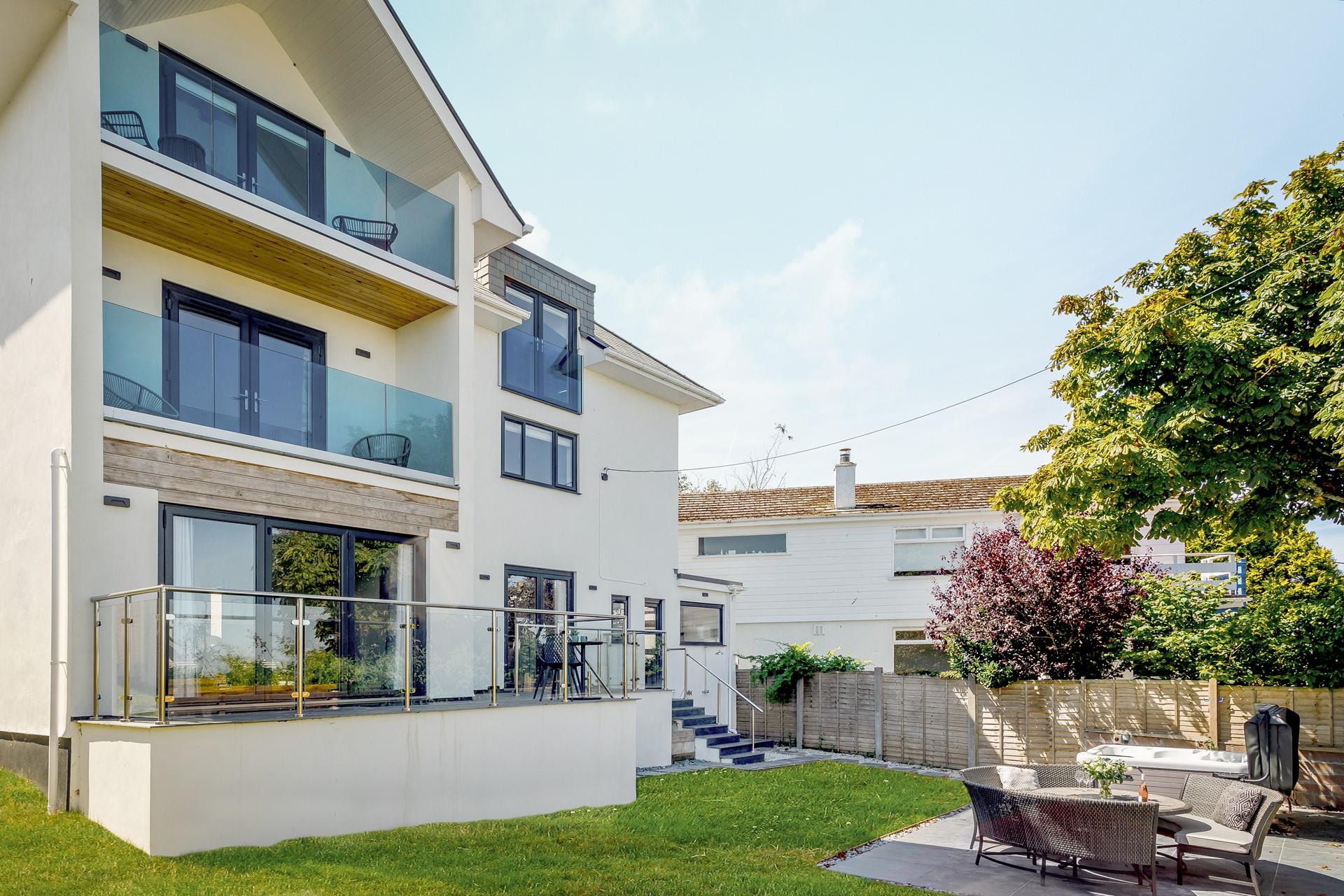 The large garden is enclosed for the little ones to play safely.
