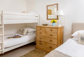 Bedroom 4 has bunk beds and a single bed, perfect for the kids to share.