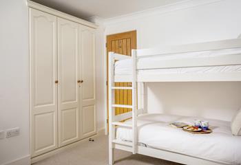 The little ones will love climbing into the bunk beds each night.