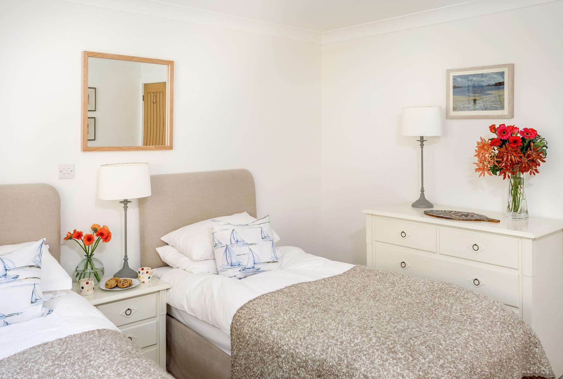 The twin beds are perfect for adults or children to tuck into.