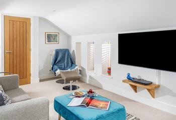 Settle in for a family movie night in the upstairs snug.